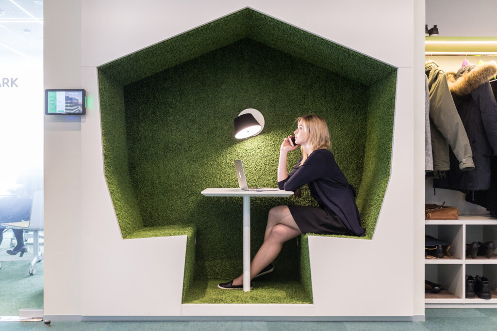 Young woman working at an office in Estonia. Photo by Renee Altrov.
